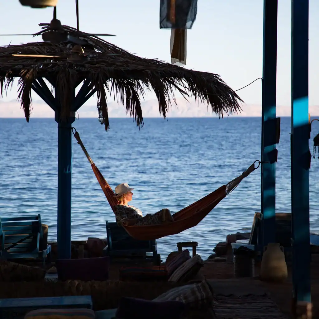 Woman enjoy the sound of the sea in Dahab